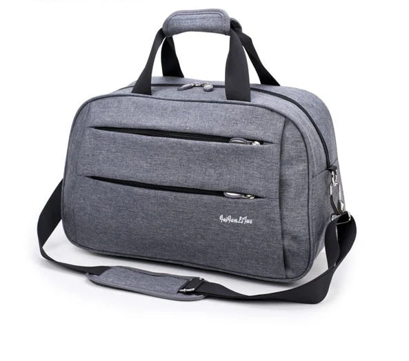 Unisex travel carry-on bag, full view, showcasing its sleek design and practical features