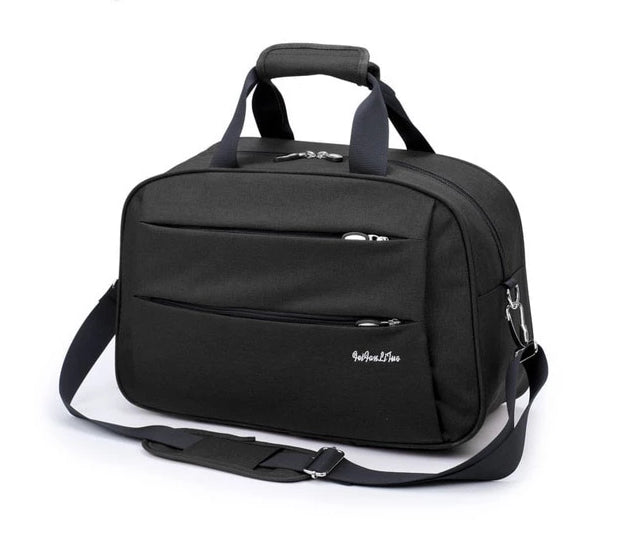 Black travel carry-on bag, detailed view of strong stitching and quality construction
