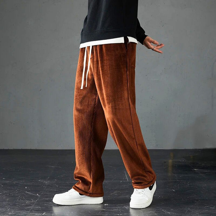 Unisex corduroy joggers, ultra-soft for stylish comfort. Relaxed fit loungepants with elastic waist.