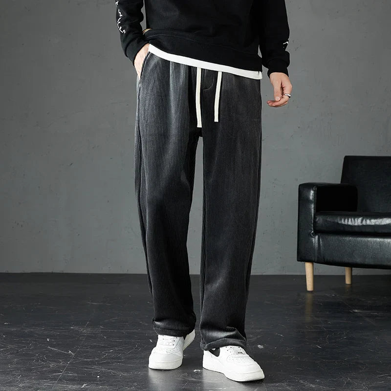 Ultra-soft corduroy joggers with elastic waist. Unisex relaxed fit comfortwear for ultimate lounging.