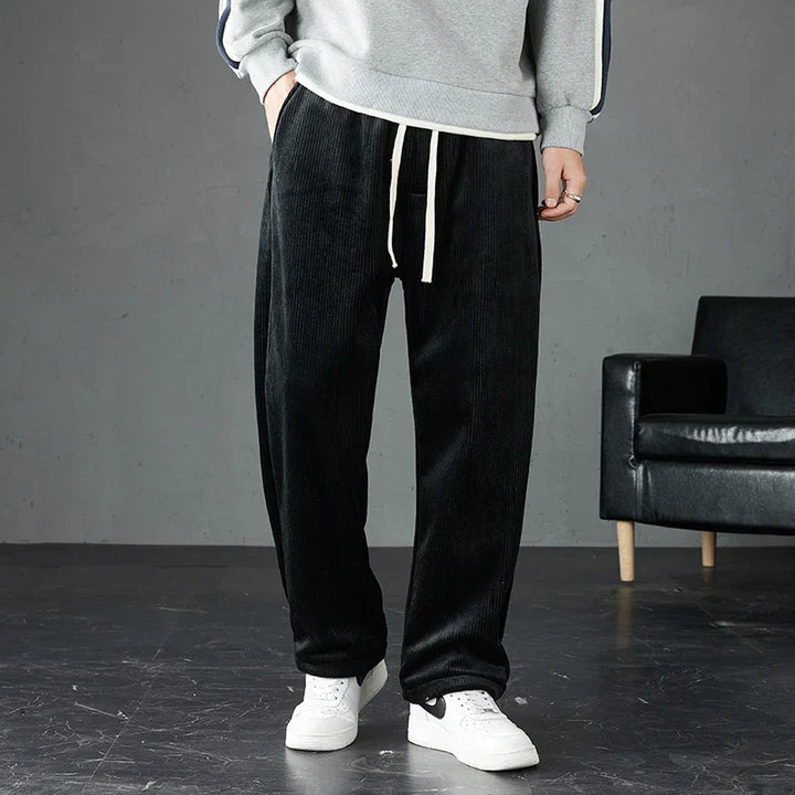 Comfortable corduroy joggers, unisex design. Soft-touch fabric, perfect for relaxed casual style.