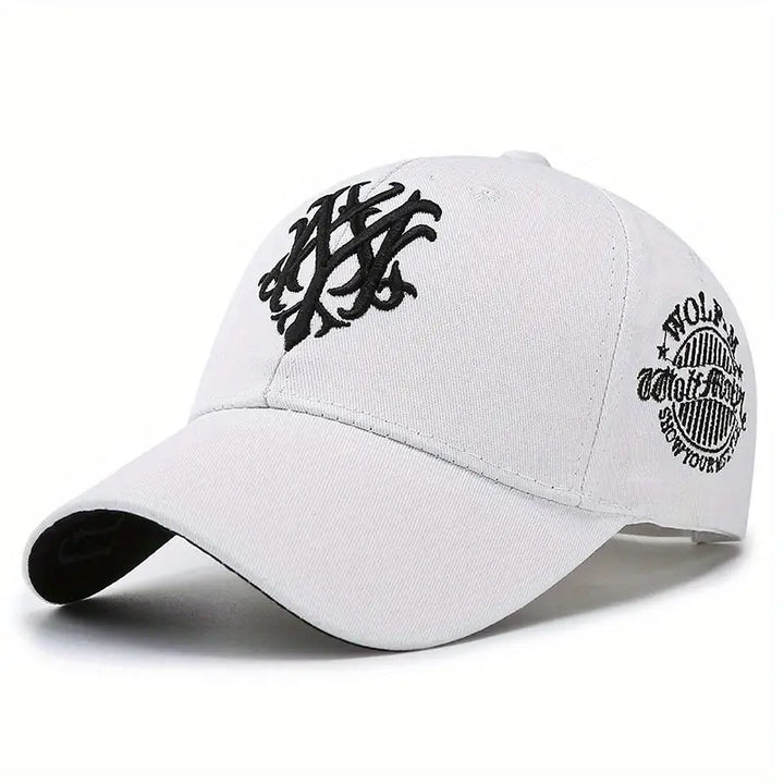 Close-up of the detailed embroidered wolf on a comfortable unisex cotton baseball cap.