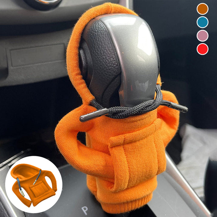Tan cotton car shift cover, adding elegance and protection to car interior decor.
