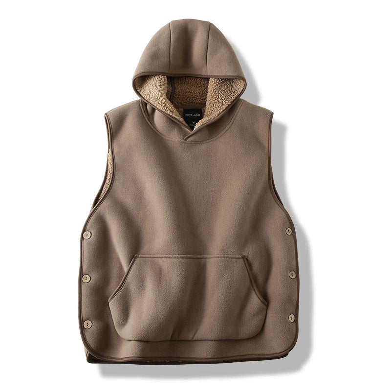 Sleeveless unisex hooded fleece vest, ideal for layering outerwear, offering comfort with pockets.