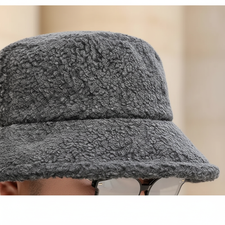 Cozy beige fleece bucket hat, ideal for keeping warm and fashionable in winter