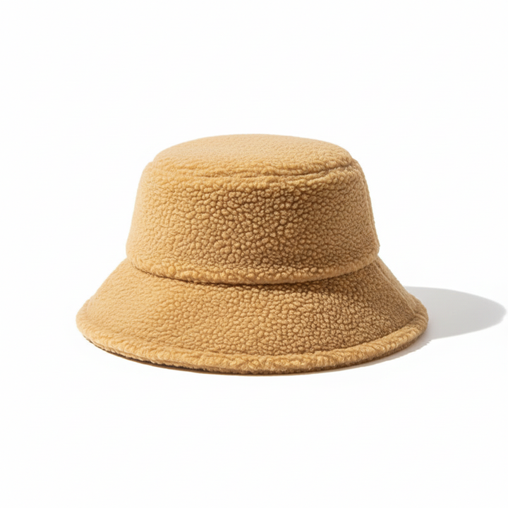 Close-up of a cozy black fleece fisherman hat texture, emphasizing its warmth and quality