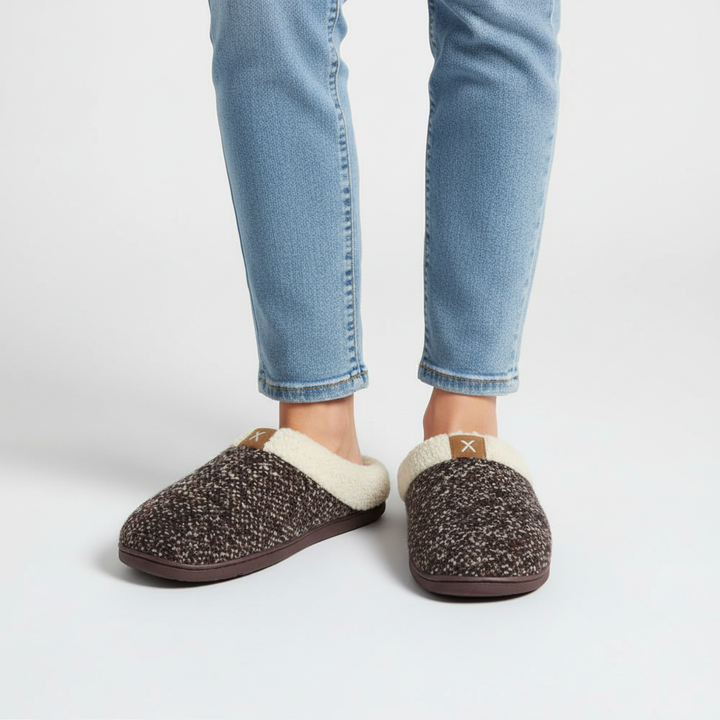 Top-down view of CloudStep unisex memory foam slippers, showcasing their plush design