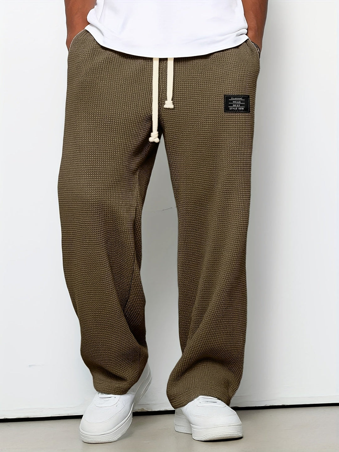 Unisex cozy waffle knit lounge pants in a relaxed fit, perfect for comfortable casual wear.