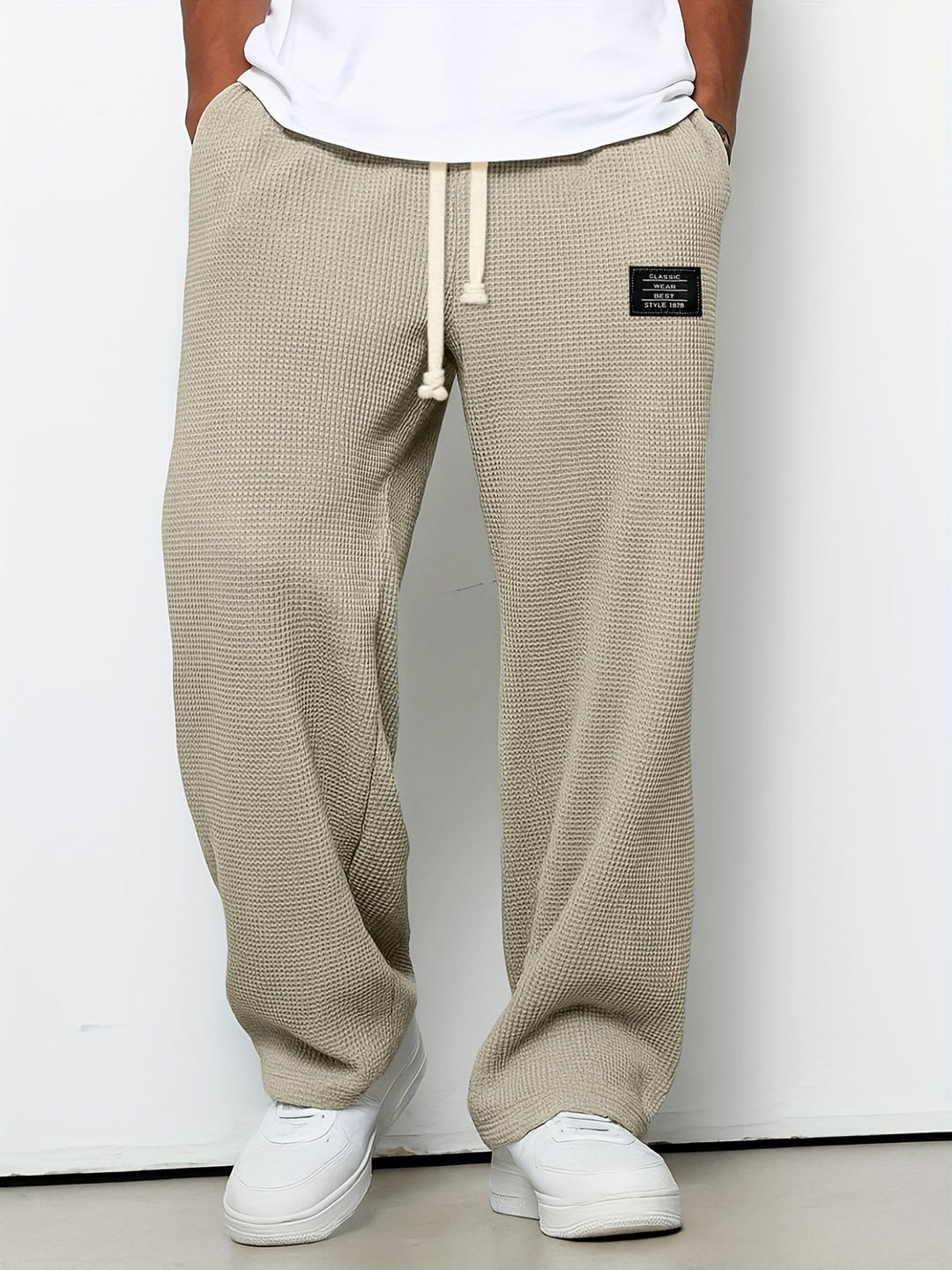 Relaxed fit unisex waffle knit pants, ideal for lounging and casual wear, featuring a comfortable design.