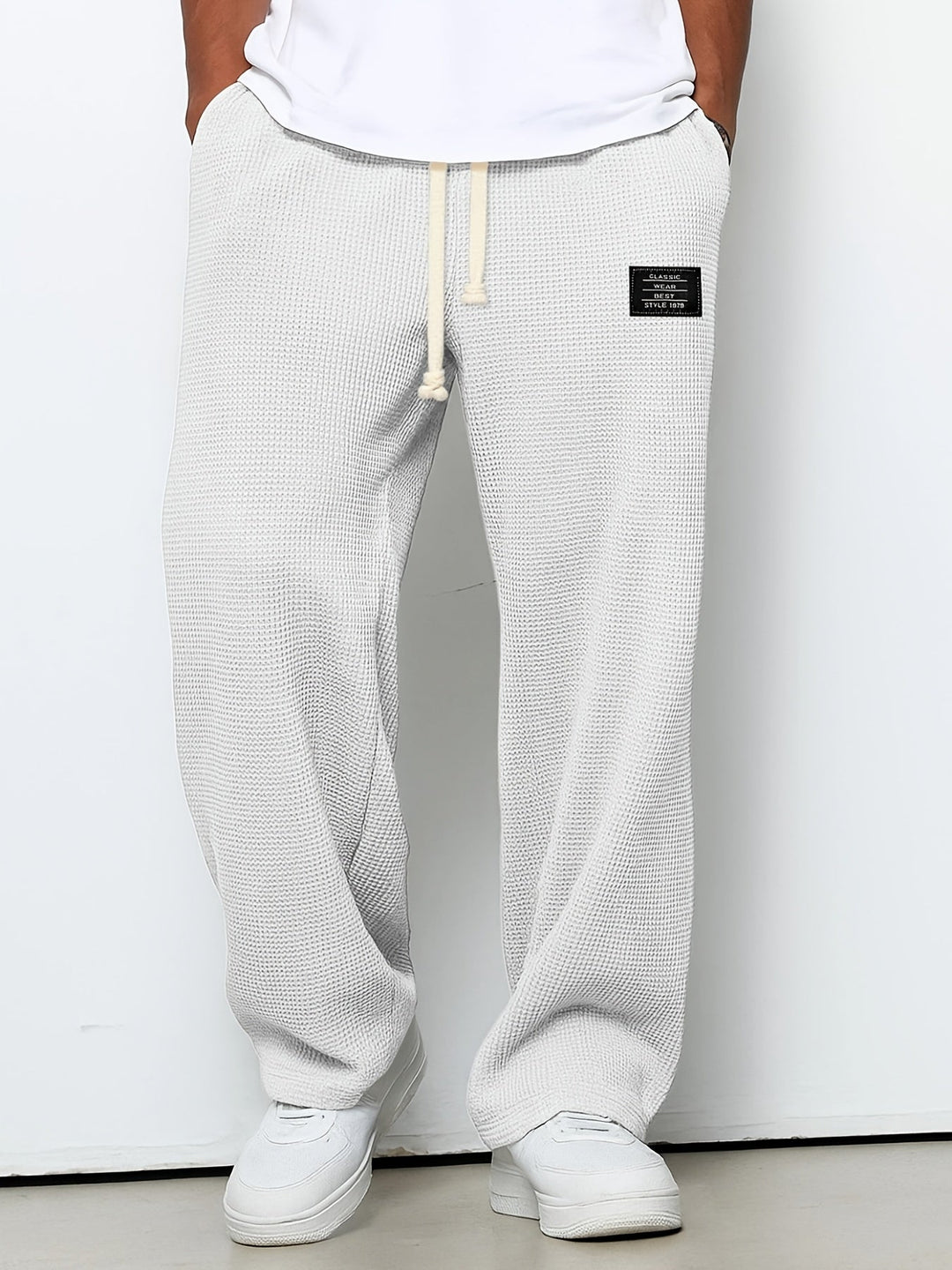 Comfortable unisex waffle weave lounge pants, soft and breathable, perfect for at-home relaxation.