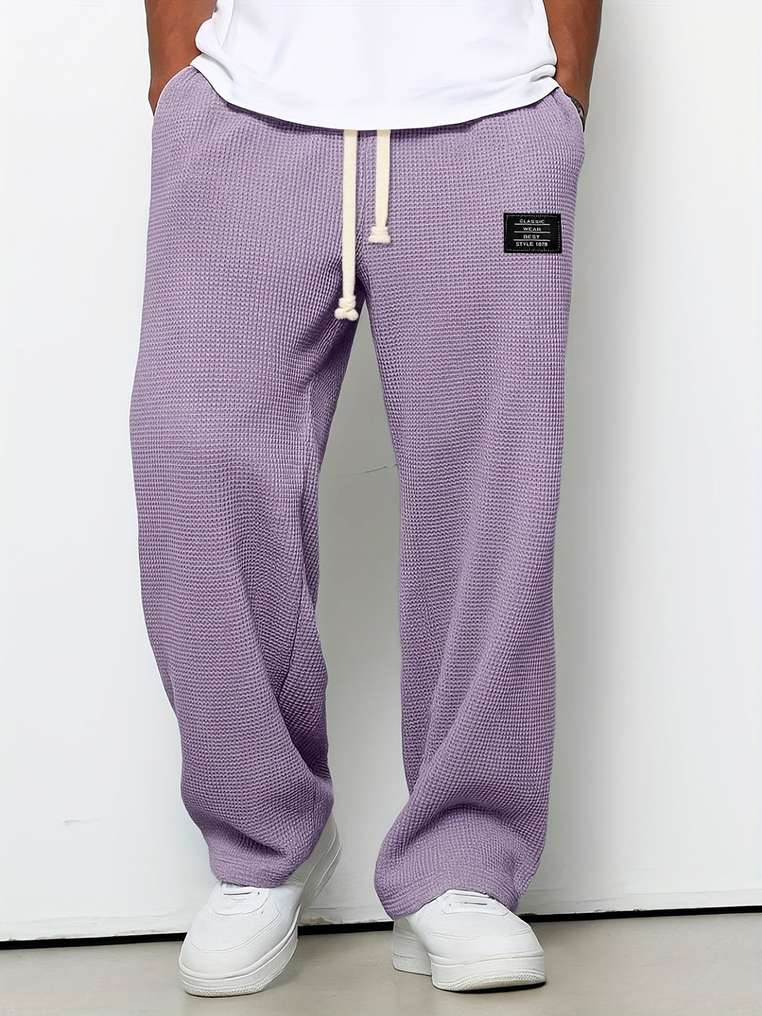 Soft, comfortable unisex waffle lounge pants. Relaxed fit design ensures ultimate leisure and style.