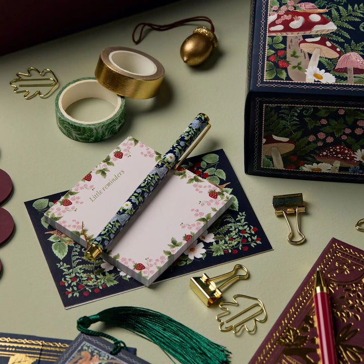Unisex holiday advent calendar for stationery lovers, featuring notebooks, pens, and craft supplies
