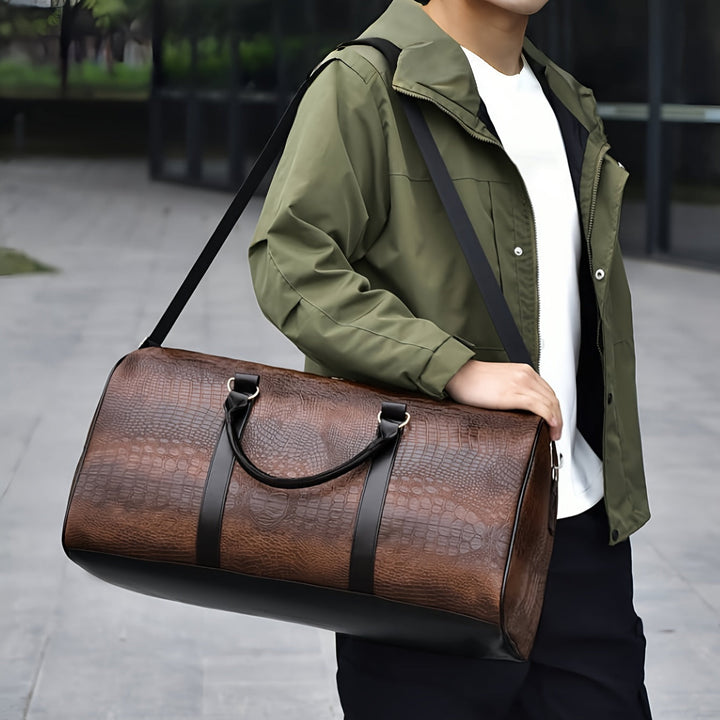 Waterproof & scratch-resistant croc-embossed vegan leather weekender for travel. Unisex duffle bag carry-on.