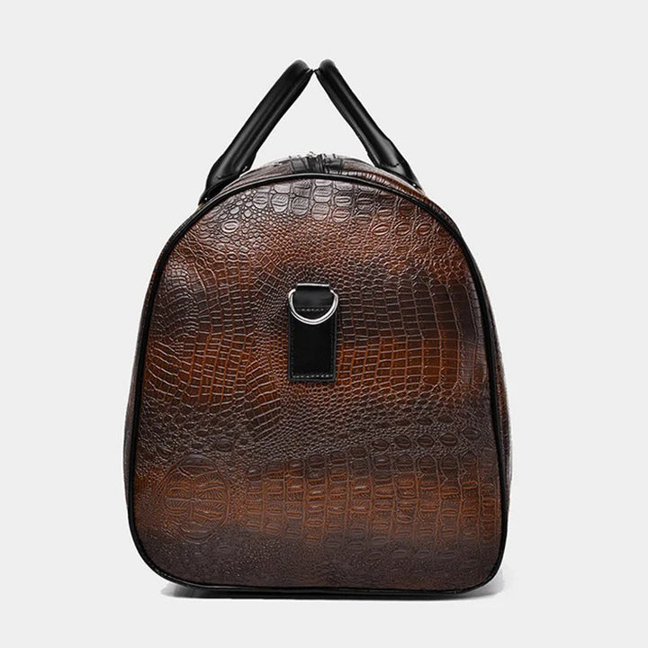 Durable croc-embossed vegan leather duffle. Waterproof, scratch-resistant unisex weekender travel bag.