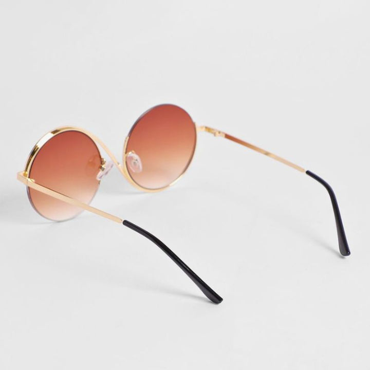 Close-up of sleek curved frame unisex sunglasses, highlighting lightweight design and effective UV eye protection.