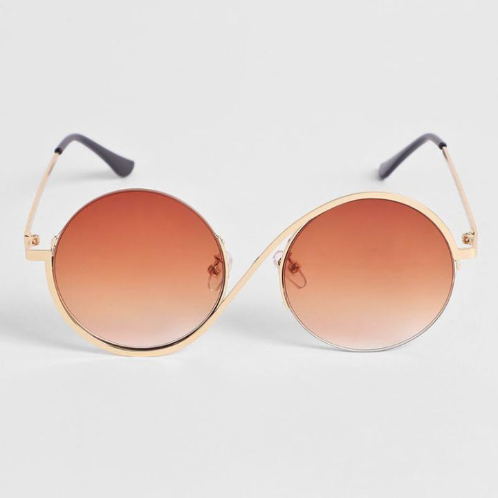 Unisex model wearing stylish gray curved frame sunglasses, showcasing comfortable fit and UV protective eyewear.