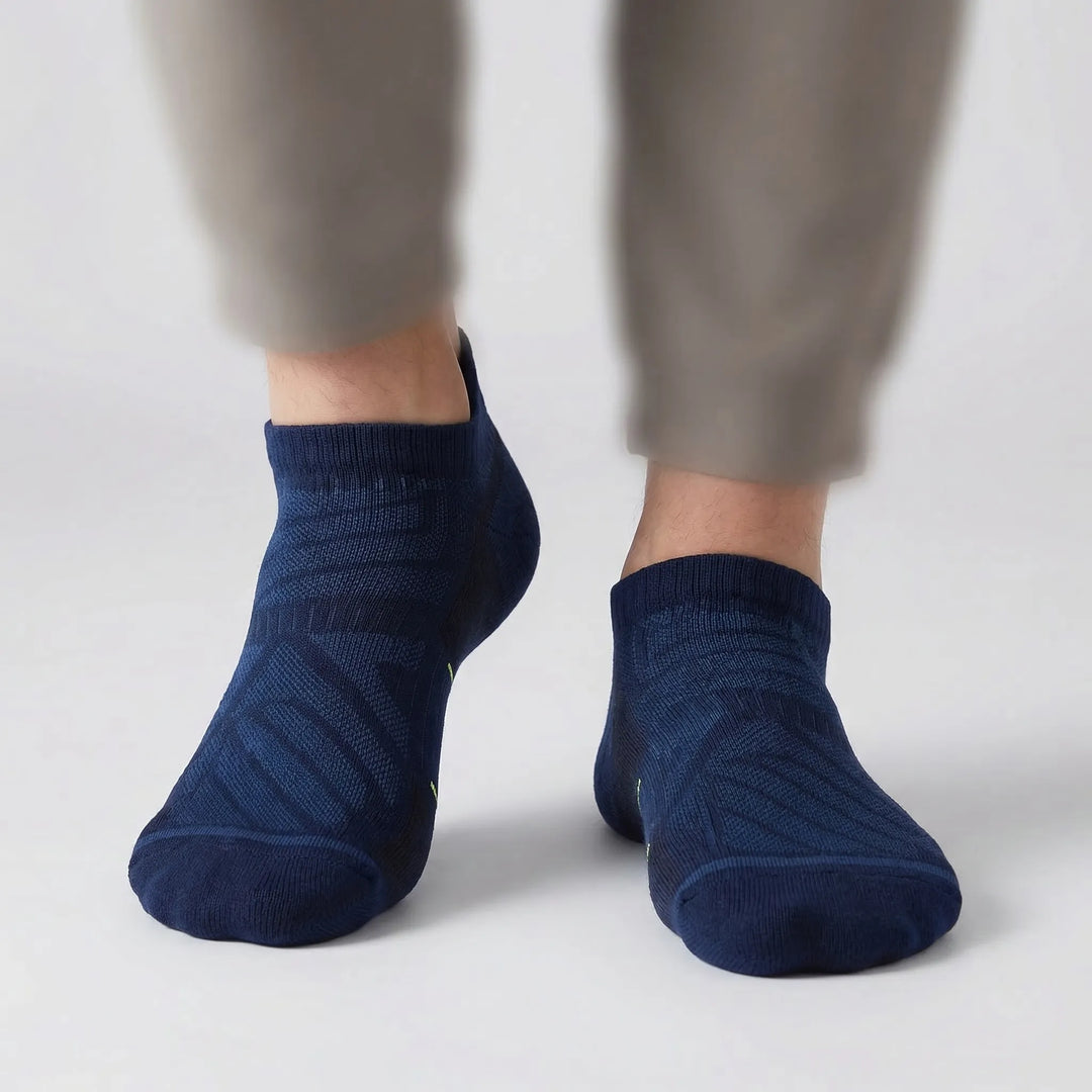 Performance unisex no-show ankle socks with cushioning. Engineered for running, sports, and active training.