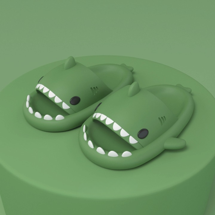 Side view of soft shark slides, showing thick cushioning & lightweight design for summer comfort