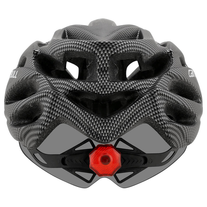 Mountain bike helmet with rear light, providing safety and airflow for trails.