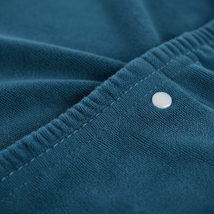 Adjustable unisex dark blue microfiber bath wrap, ideal absorbent spa and beach towel.