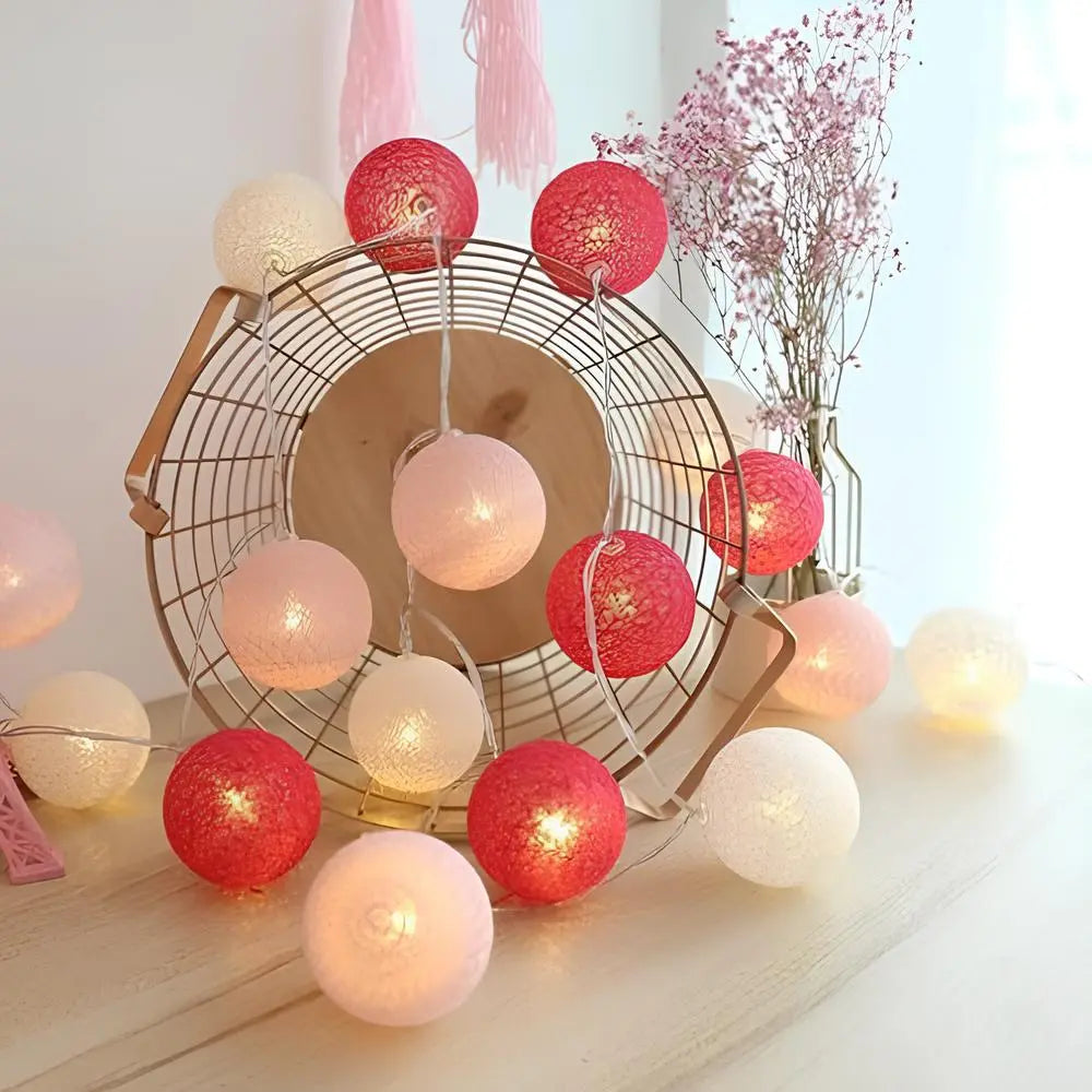 Modern home decor: cotton ball string lights providing a subtle glow in a living room setting.