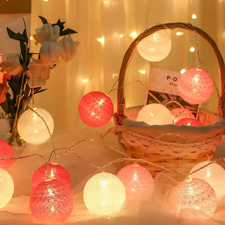 Fairy lights: cotton ball string lights illuminating a child's bedroom for a magical ambiance.