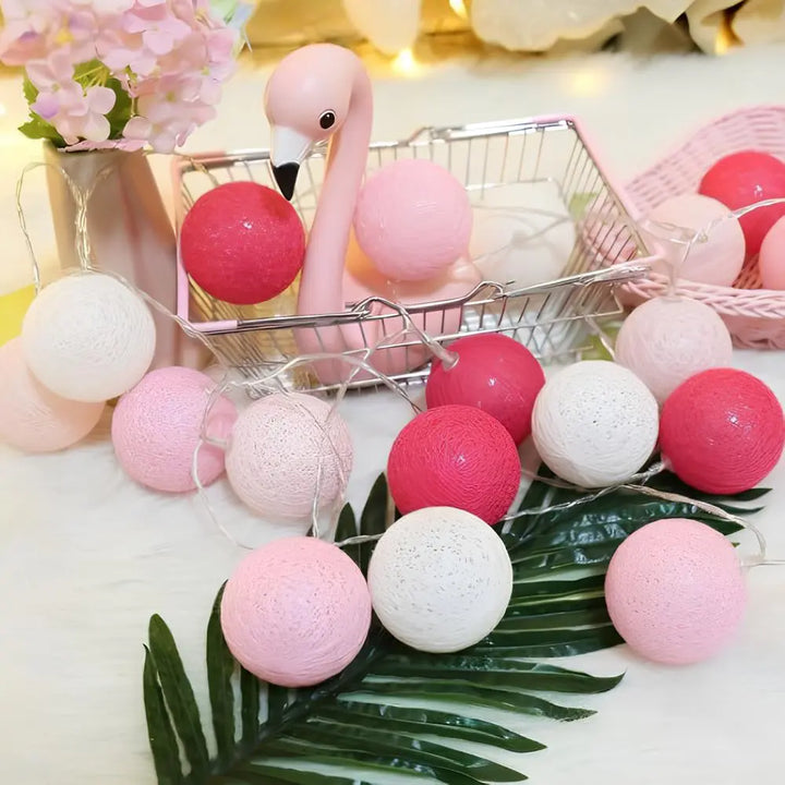 Unisex decorative lighting: neutral-toned cotton ball string lights for elegant decor.