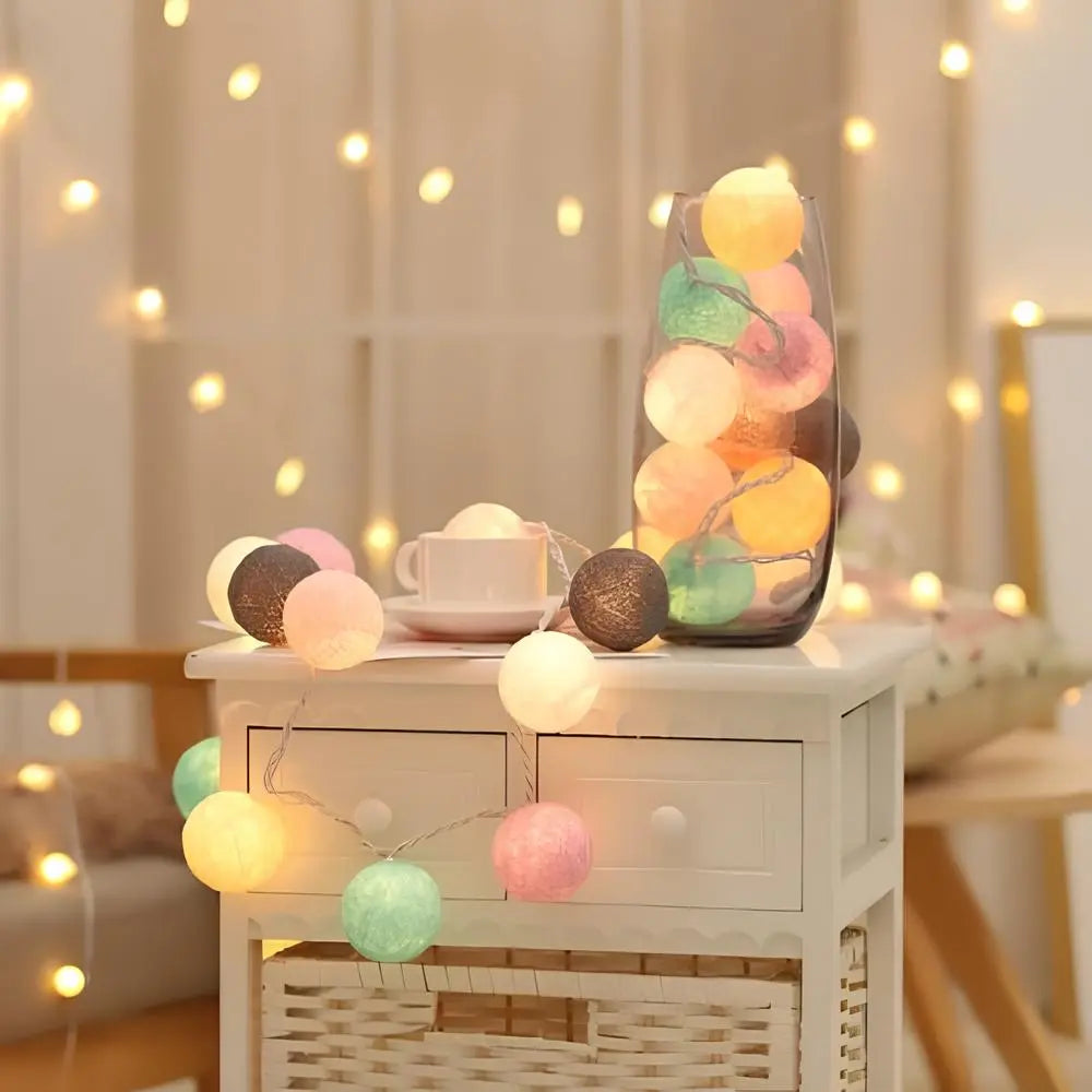 LumaBreeze cotton ball fairy lights, battery operated, ideal for bedroom or party decoration.
