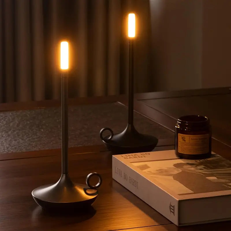 Luxury wireless LED table lamp, flame-free candle holder design with touch control for accent lighting.