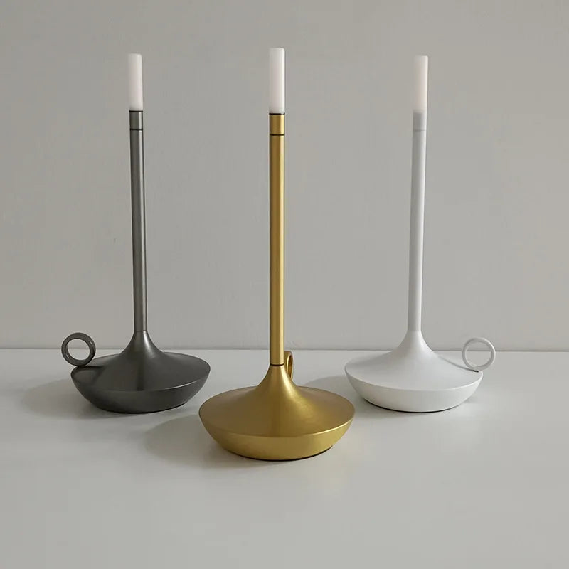 Luxury wireless table lamp, LED candle holder providing ambient, flame-free decorative light.