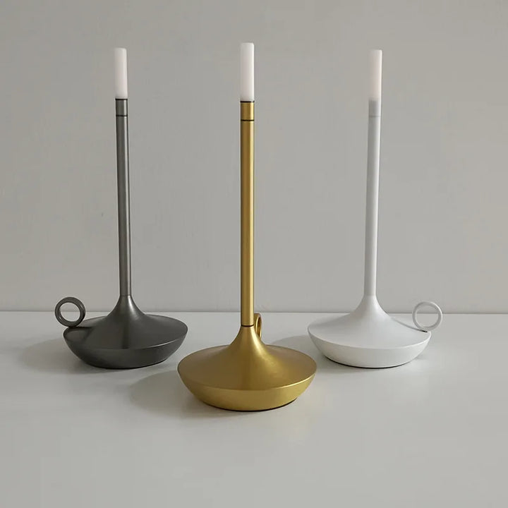 Luxury wireless table lamp, LED candle holder providing ambient, flame-free decorative light.