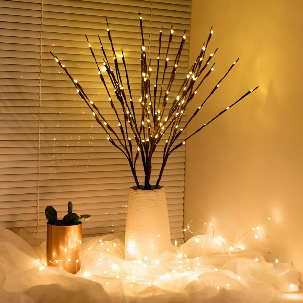 Decorative branches featuring small LED lights, enhancing home interior