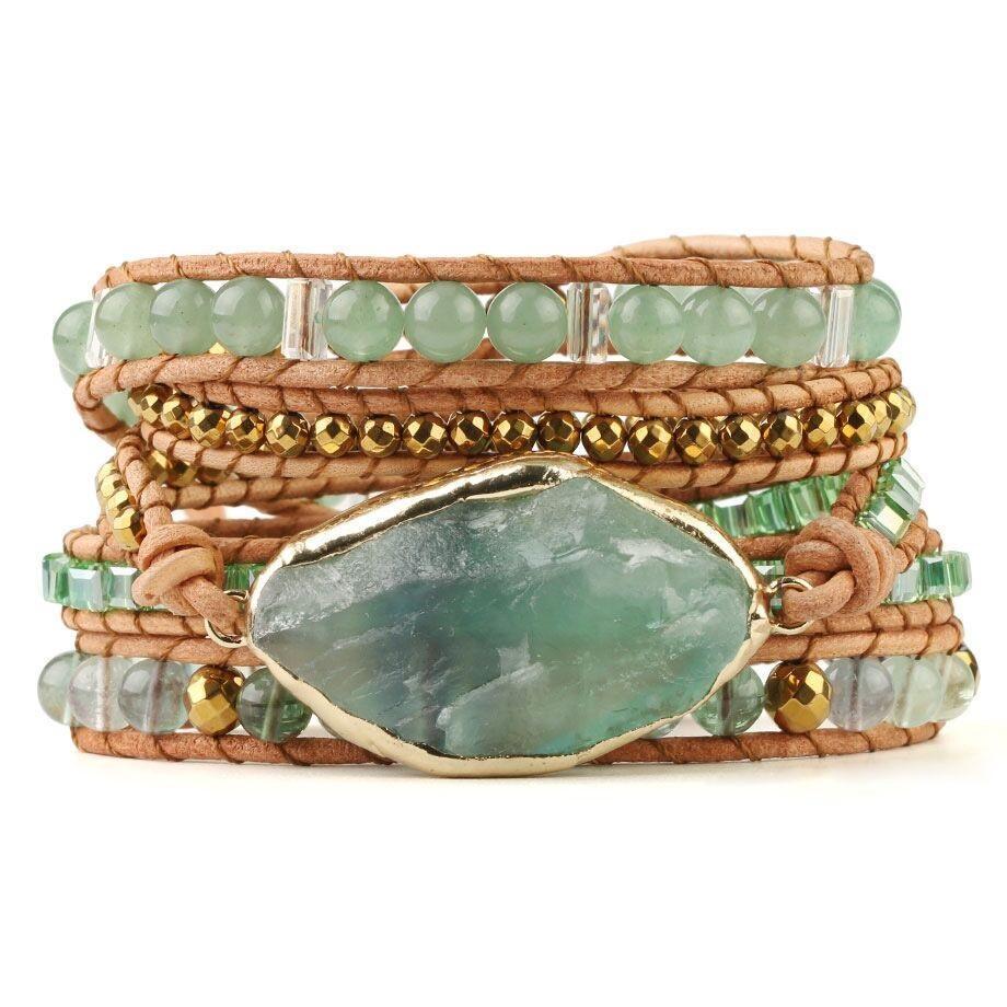 Model wearing a unisex fluorite wrap bracelet, showcasing its multi-strand design