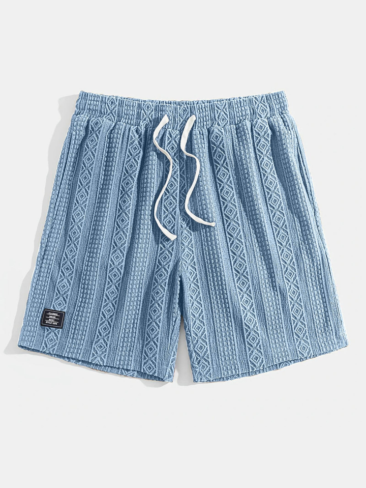Stylish textured relaxed fit lounge shorts, unisex cotton blend knit.