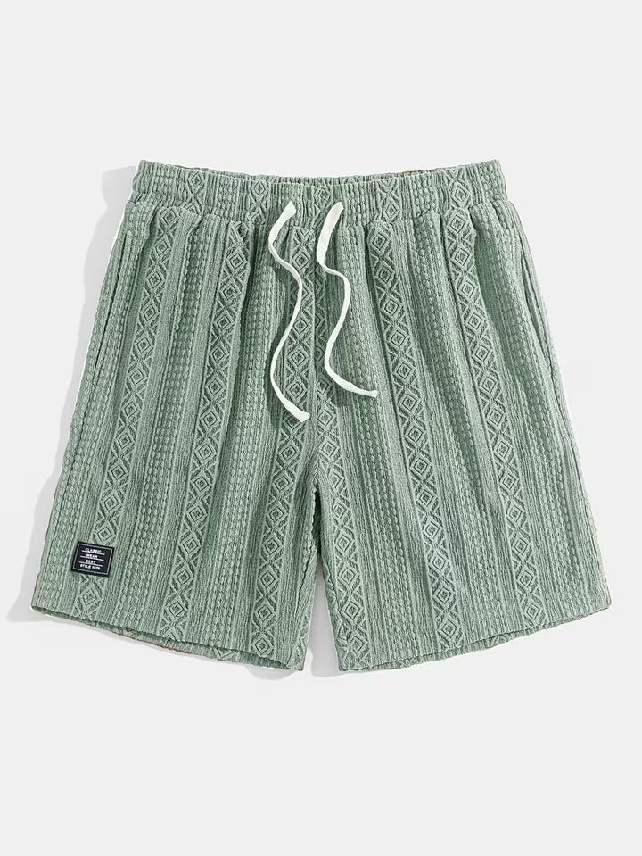 Cotton blend unisex relaxed fit shorts, comfortable diamond knit texture.