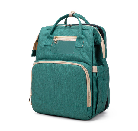 Unisex diaper backpack worn, showcasing its sleek design & multi-pocket organization for parenting essentials.