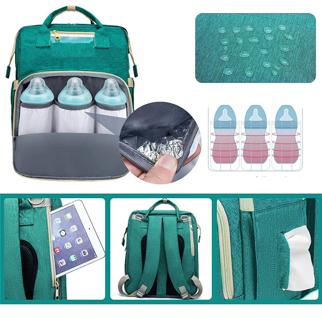 Happy parent with baby beside a convertible diaper backpack & unfolded bassinet for travel convenience.