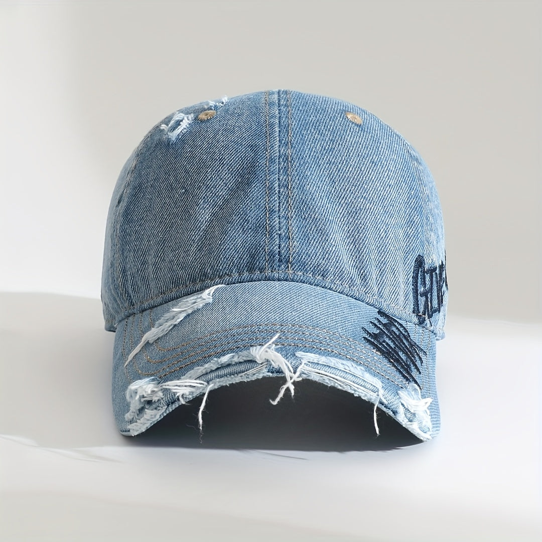 Washed denim baseball cap, distressed look, "Never Give Up" graffiti. Casual unisex headwear, adjustable.