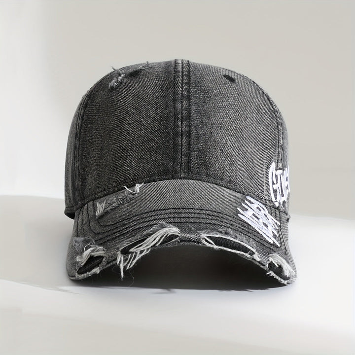 Faded washed denim cap, distressed detailing, "Never Give Up" statement embroidery. Unisex adjustable hat.