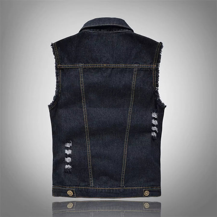 Authentic distressed unisex denim vest, designed for an iconic punk rock and streetwear look.