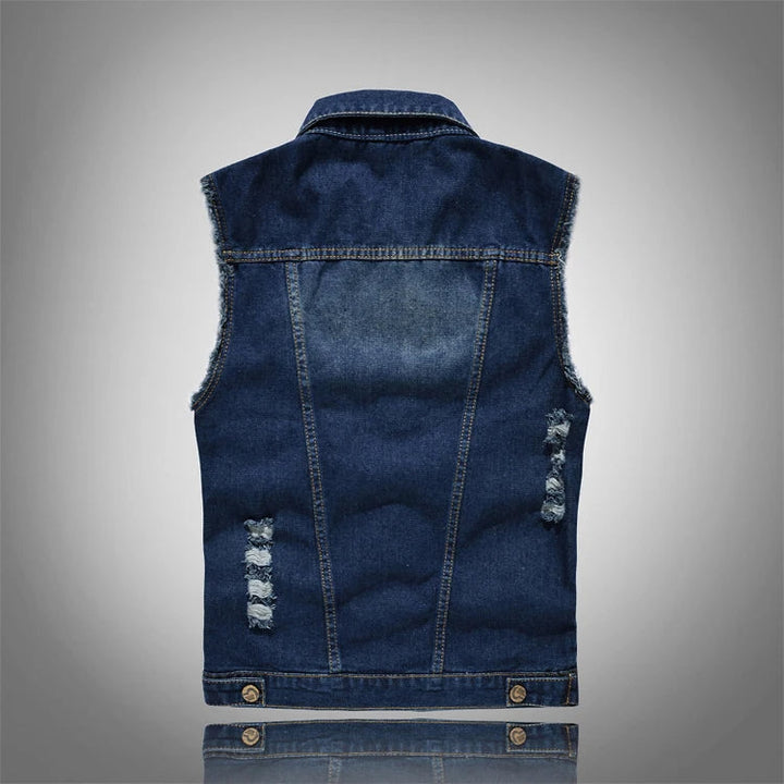 Modern distressed denim vest, unisex design, offering a rebellious touch to any streetwear or rocker ensemble.