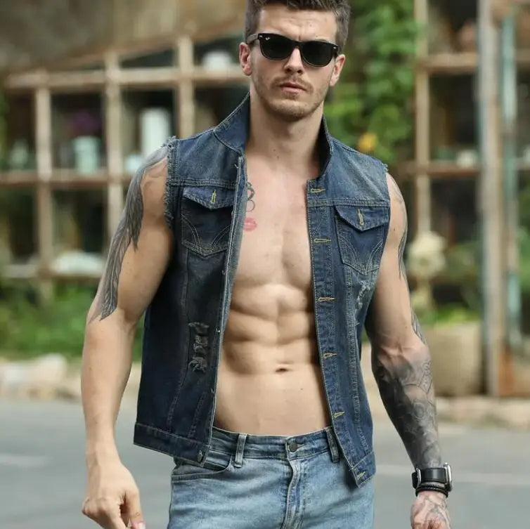 Stylish unisex denim vest with distressed details, ideal for a punk-inspired sleeveless jacket look.