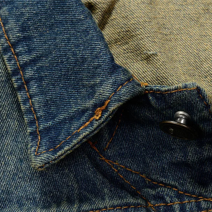 Heavyweight denim vest, unisex and distressed, offering an edgy statement for streetwear outfits.