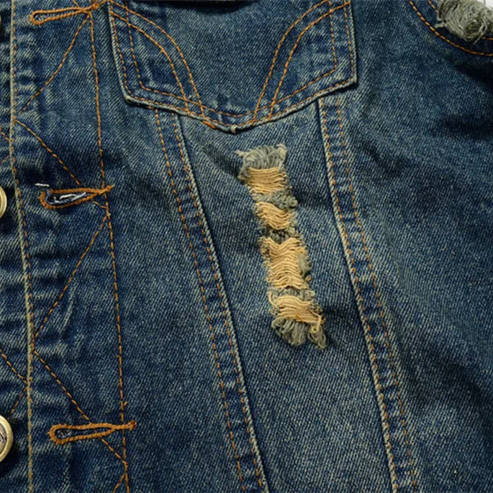 Classic unisex denim vest, heavily distressed, transforming any outfit into a cool streetwear statement.