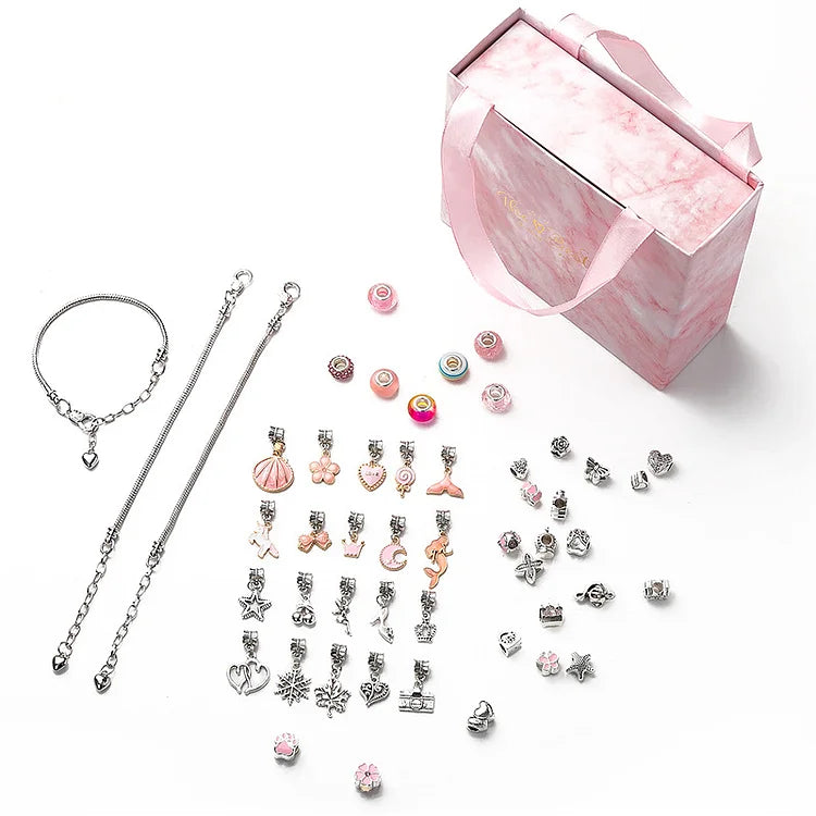 DIY Christmas jewelry craft kit with assorted star & animal charms. Great for unisex bracelet making fun.