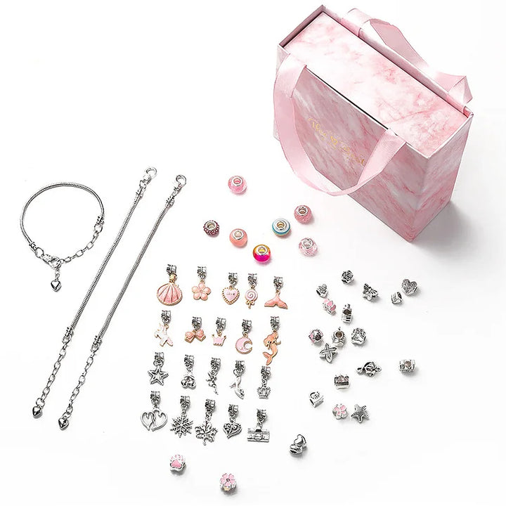 DIY Christmas jewelry craft kit with assorted star & animal charms. Great for unisex bracelet making fun.
