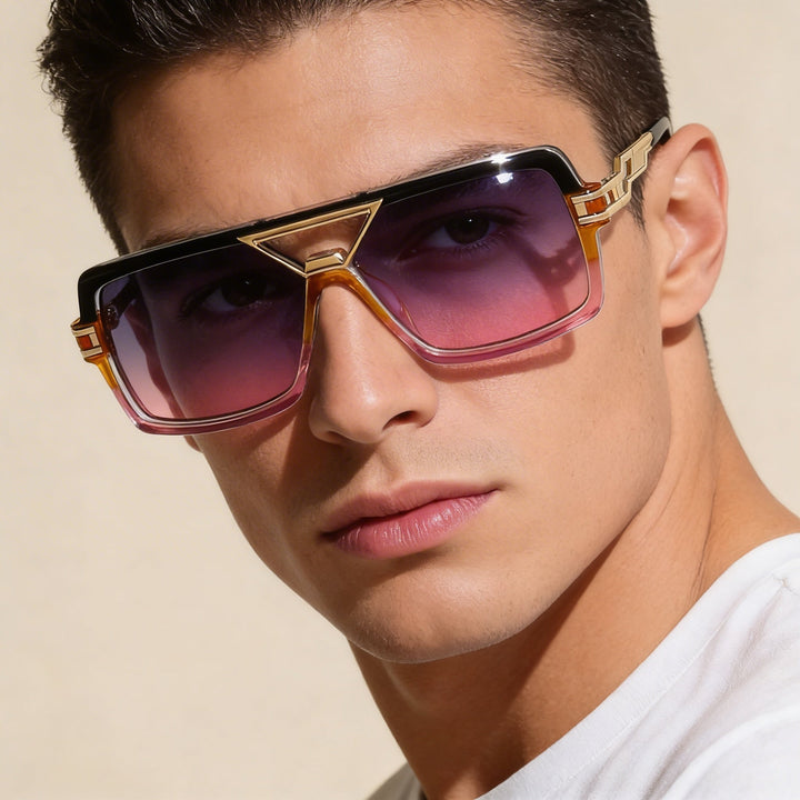 Modern double bridge sunglasses, black lenses, and gold metal frame, offering UV protection.