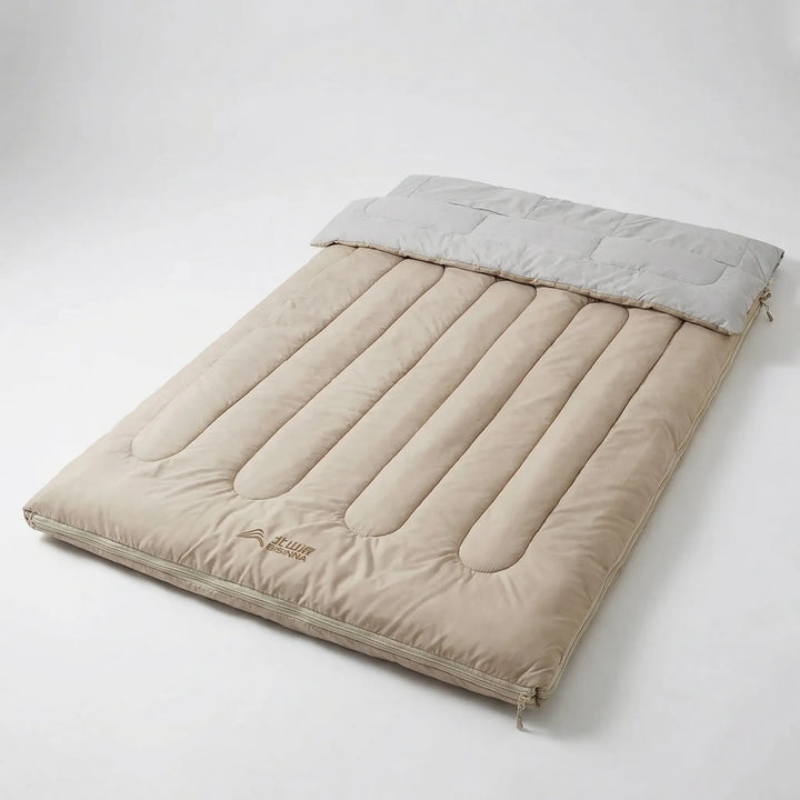 Outdoor camping sleeping bag for couples. Detachable design offers versatility for hiking & travel gear.
