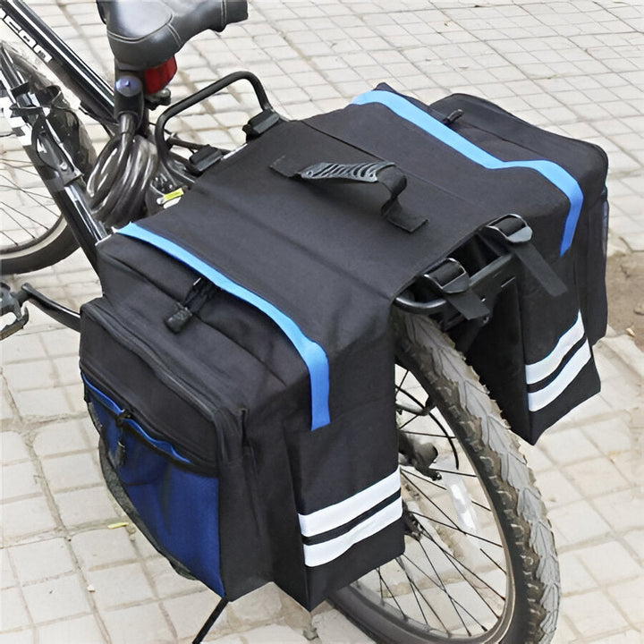 Unisex double pannier bike bag on rear rack, water-resistant, ideal for cycling, commuting & bicycle storage.