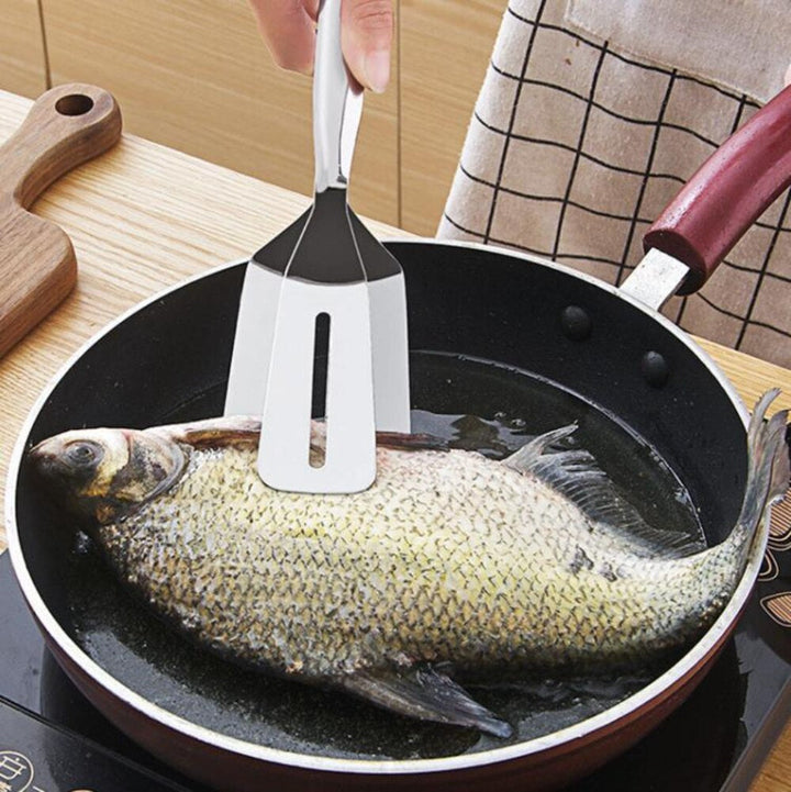 High-quality stainless steel kitchen tool. Double-sided spatula for versatile cooking, from baking to grilling.